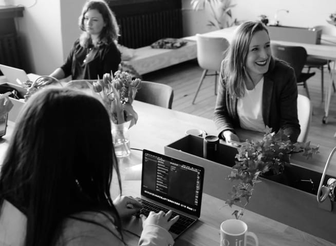 Happy employees working in an office